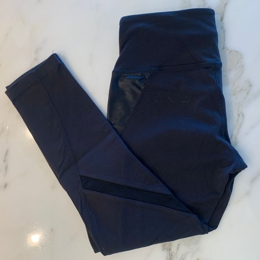Splits 59 | Tech Flex capris with leather details. High-waisted fit